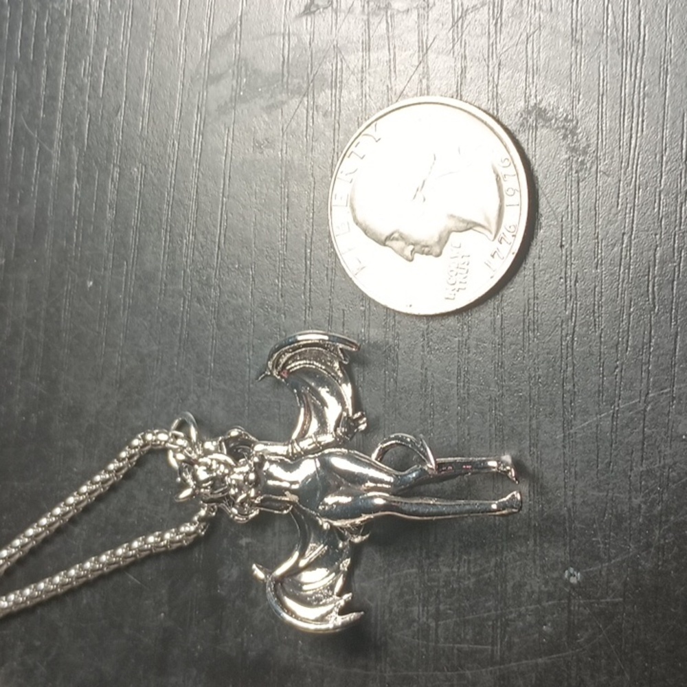 Devil girl pendant necklace.
